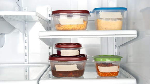 tupperware on refrigerator shelves